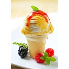 Ice cream cone with raspberry sauce